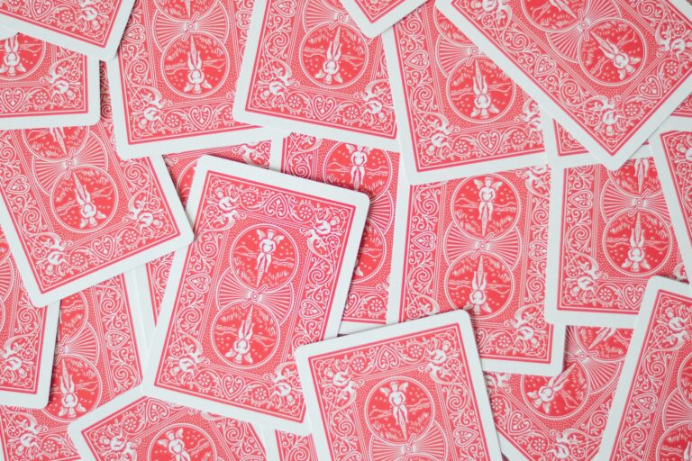 A pile of red and white playing cards
